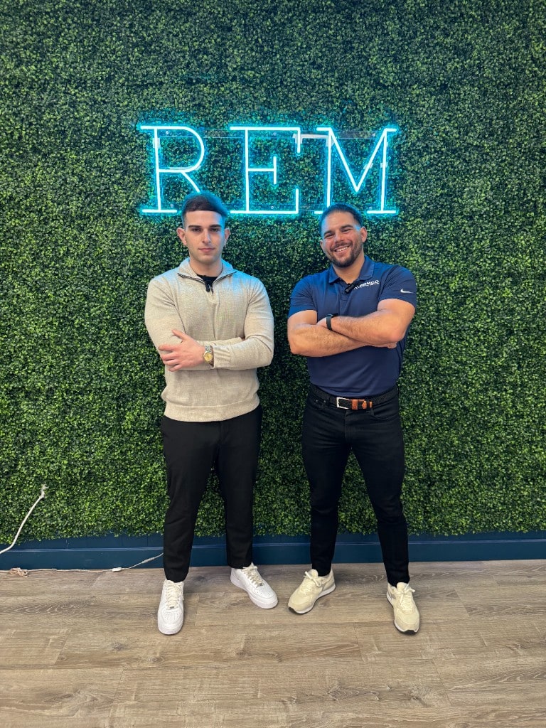 Jay Falconio at a local business in front of the REMCO neon sign